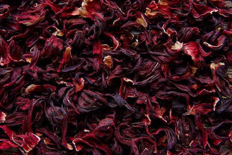 Zdjęcie kwiat jamajki dla ziołowej mrożonej herbaty z hibiskusa