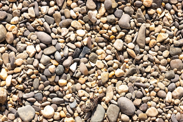 Zdjęcie Ładny obraz tła z kamyków na plaży