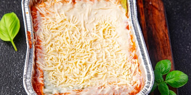 lasagne pojemnik na warzywa przekąska posiłek wegetariański jedzenie na stole kopia przestrzeń żywności tło