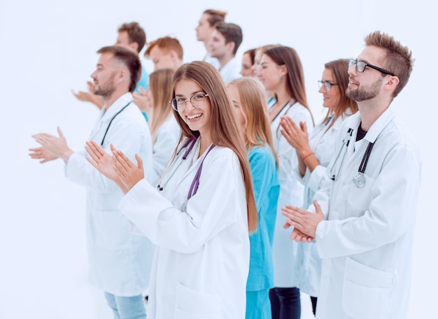 Zdjęcie lekarka i jej koledzy dają owację na stojąco