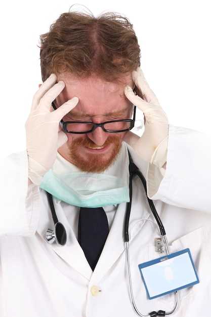 Zdjęcie lekarz mający ból głowy