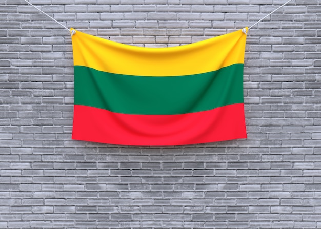 Zdjęcie litwa flaga wisi na mur z cegły