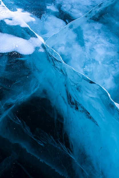 Zdjęcie lodowa tekstura na powierzchni zamarznięty jezioro, natury tła wizerunek