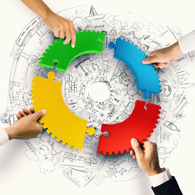 Zdjęcie ludzie biznesu dołączają do kolorowych puzzli
