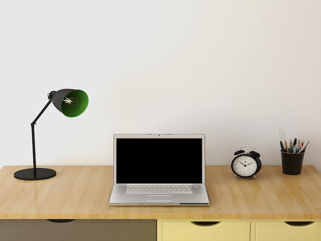 Makieta biurka i laptop z pustym ekranem