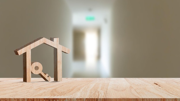 Makieta drewniany dom i klucz na drewnianym stole koncepcja inwestycji w nieruchomości Planowanie oszczędności pieniędzy w postaci monet Kup koncepcję domu dla nieruchomości hipotecznych i inwestycji w nieruchomości