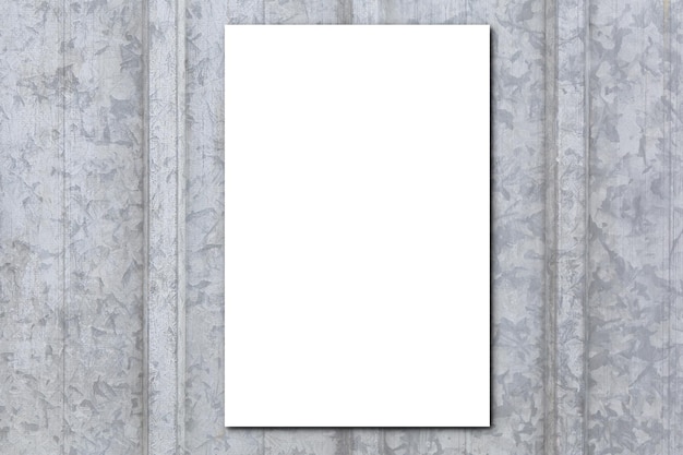 Zdjęcie makieta plakatu pusty biały pionowy prostokąt z miękkim cieniem na szarym stalowym aluminiowym tle w płaskim widoku z góry