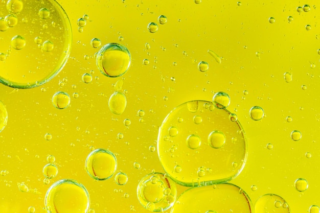 Makro żółte bąbelkizłote żółte bańki olejowe abstrakcyjne tło