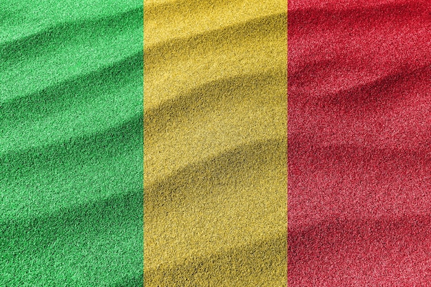 Zdjęcie mali piasek flaga, flaga narodowa piasek tło