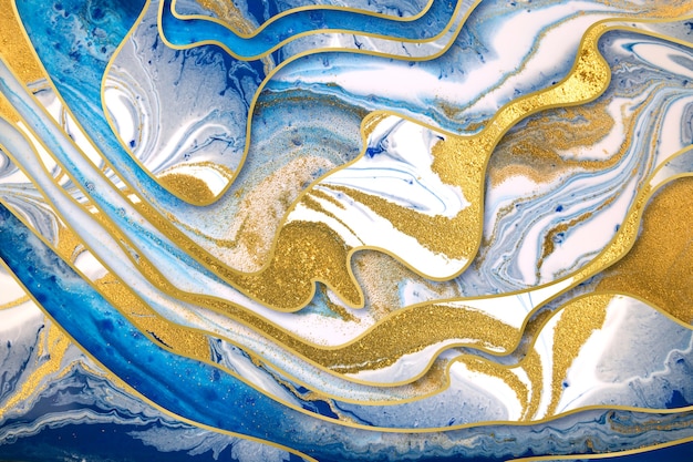Marmurowy niebieski atrament i złoty pył abstrakcyjne tło ze złotymi granicami gradientu