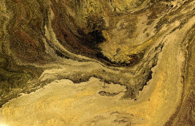 Marmurowy wzór mieszanego atramentu w kolorze złota i brązu