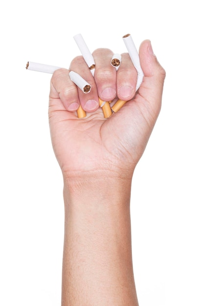 Mężczyzna rozbijający papierosa ręką wyizolowany na białym tle STOP Smoking World no tobacco day concept