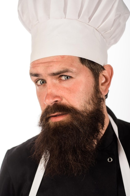 Zdjęcie mężczyzna szef kuchni profesjonalny kucharz lub piekarz koncepcja żywności brodaty szef kuchni w jednolitym kapeluszu i fartuchu szefa