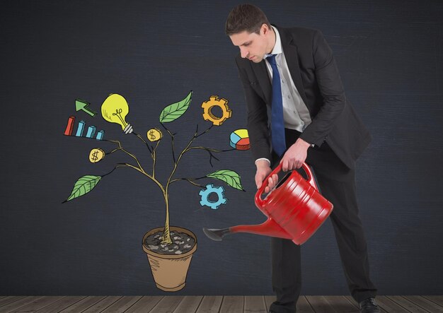 Mężczyzna trzymający konewkę i rysowanie grafiki biznesowej na gałęziach roślin na ścianie