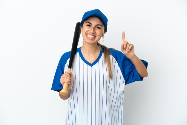Młoda kobieta kaukaski gry w baseball na białym tle pokazując i podnosząc palec na znak najlepszych