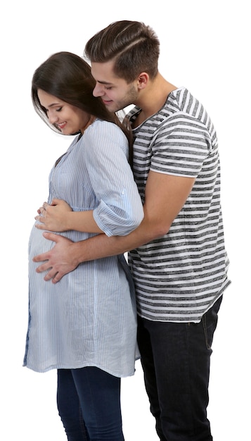 Młoda kobieta w ciąży z mężem na białym tle