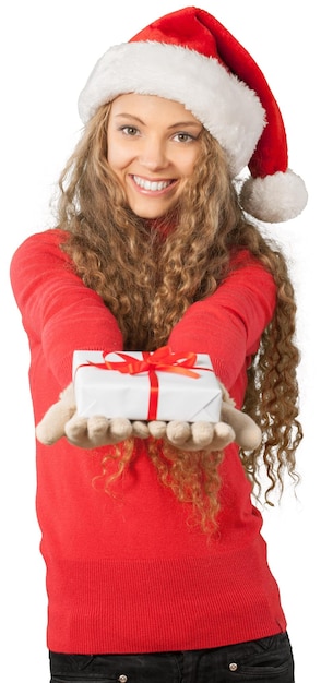 Młoda kobieta w Santa Hat trzymając prezent - na białym tle