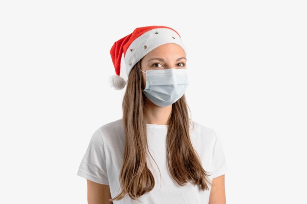 Młoda Kobieta Z Medyczną Maską I Santa Hat