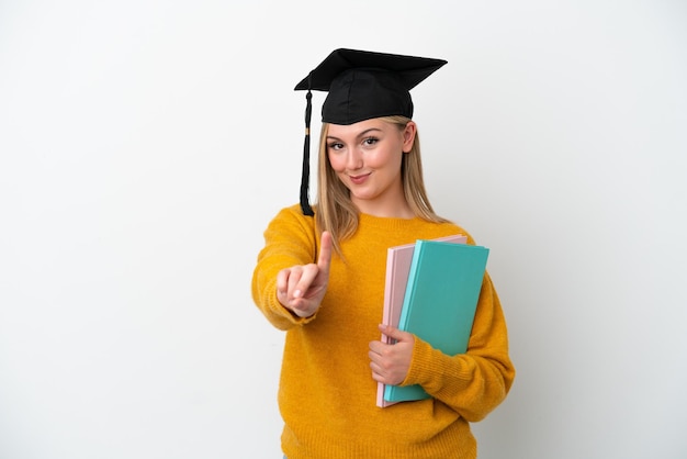 Młoda Studentka Kaukaska Kobieta Na Białym Tle Pokazująca I Unosząca Palec