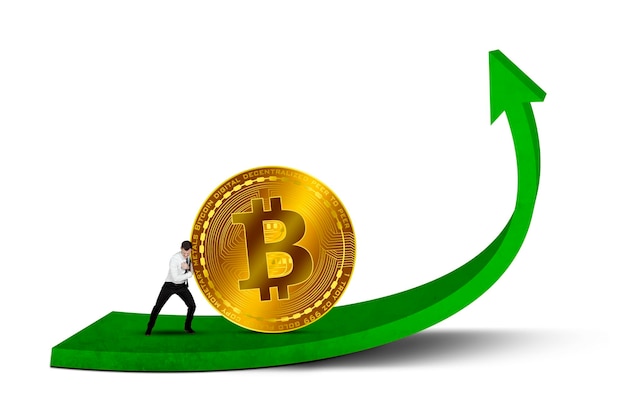 Moneta Bitcoin w kolorze złota na zielonej wstążce z strzałką pokazującą wzrost wartości kryptowaluty