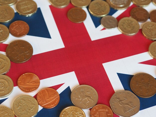 Zdjęcie monety funtowe, wielka brytania nad flagą
