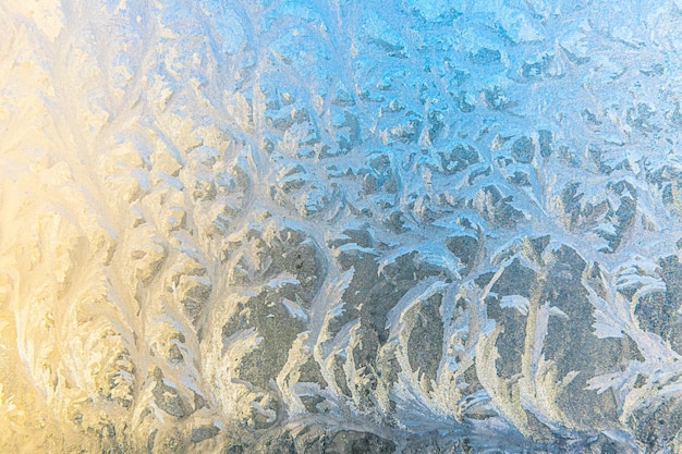 Mrożone zimowe okno z błyszczącą lodem mróz wzór tekstury Boże Narodzenie cud symbol streszczenie backgroun