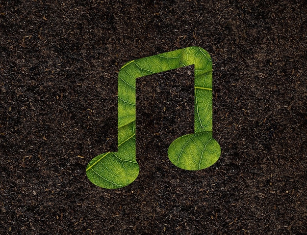 Muzyczny kształt zielonych liści na tle koncepcja ekologii gleby