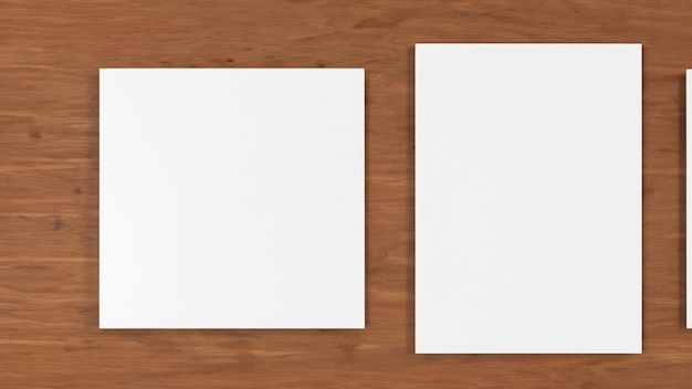 Na drewnianej podłodze leżą dwie kwadratowe kartki papieru.