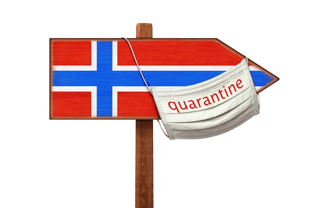 Zdjęcie na masce medycznej napis quarantine wisi na wskaźniku z wizerunkiem flagi norwegii