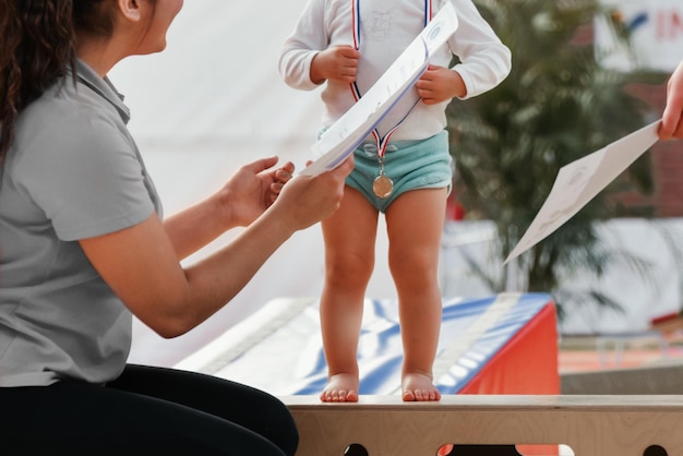 Nagrodzenie Małej Gimnastyczki Złotym Medalem