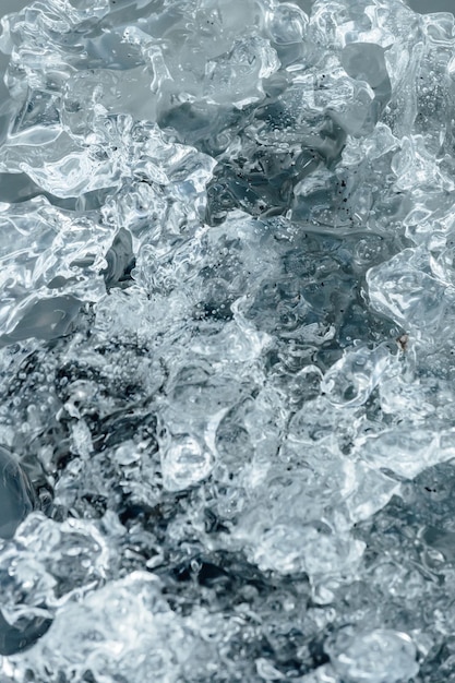Naturalny porysowany lód zamrożony projekt powierzchni jako tekstura lub tło czarownica czarna sandWallpaper z kopią miejsca Bloki lodu z laguny lodowcowej Jokulsarlon Park Narodowy Vatnajokull