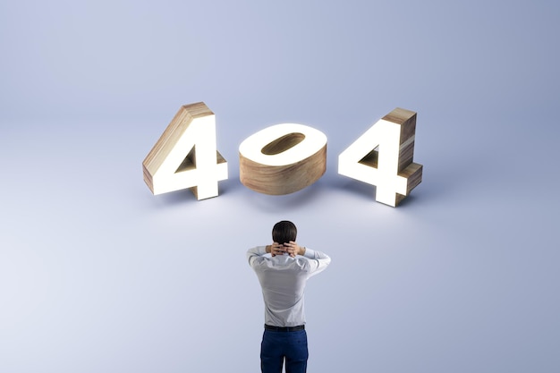 Nie znaleziono strony 404 koncepcja błędu z drewnianymi cyframi 3d i paniką osoba trzyma głowę na jasnoniebieskim tle