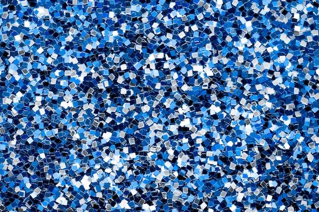 Niebieski błyszczący brokat teksturowany w tle