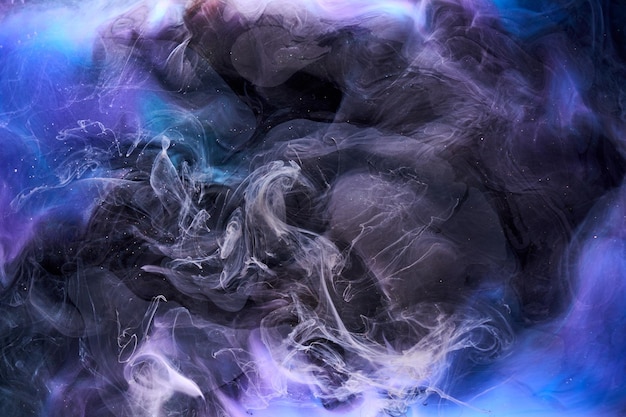 Niebieski czarny wielokolorowy dym abstrakcyjne tło farba akrylowa podwodna eksplozja