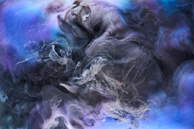 Niebieski czarny wielokolorowy dym abstrakcyjne tło farba akrylowa podwodna eksplozja