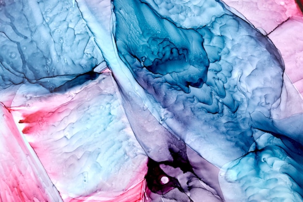 Niebieski różowy atrament abstrakcyjne tło marmurowa tekstura płynna sztuka wzór tapety mieszanka farb pod wodą
