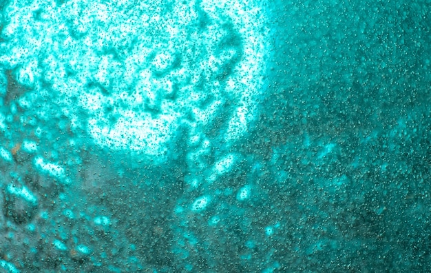 Zdjęcie niebieskie abstrakcyjne bąbelki tła na powierzchni cieczy w wodzie