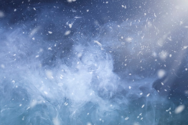 Zdjęcie niebieskie tło bajki zimowej z bokeh