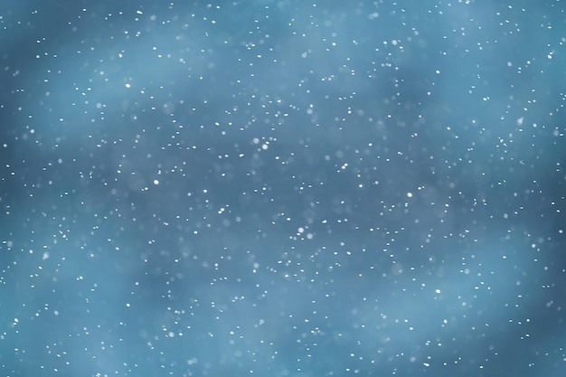 niebieskie tło bokeh śniegu, abstrakcyjne tło płatka śniegu na niewyraźnym abstrakcyjnym błękicie