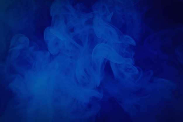 Niebieskie tło tekstury abstrakcyjne ciemne wiry dymu