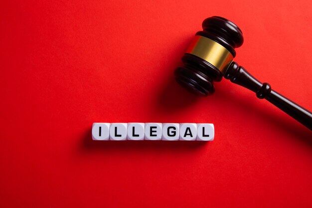 Nielegalne słowo na czerwonym tle Prawo imigracyjne