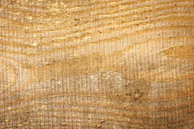 Nieociosany drewniany płotowy tekstury tło naturalni brązu i koloru żółtego kolory