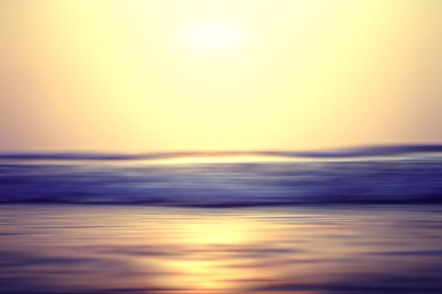 niewyraźny tło zachód słońca na morzu