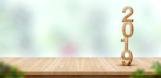 Nowego roku 2019 drewna liczba na drewnianym stole przy plama abstrakta zieleni bokeh (3d rendering)