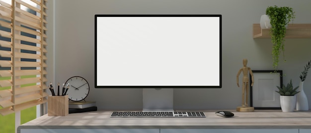 Nowoczesna minimalna biała przestrzeń robocza biura domowego z makietą komputera na białym ekranie na stole