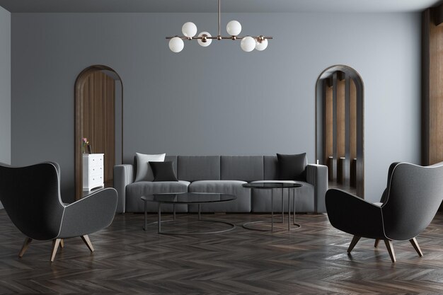 Nowoczesne szare wnętrze salonu z szarą sofą, wąskimi drzwiami i drewnianą podłogą. Makieta renderowania 3d dwóch foteli
