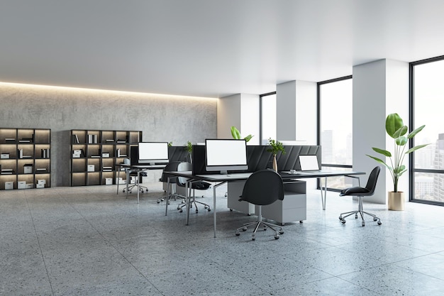Nowoczesne wnętrze biura z biurkami, komputerami i dużymi oknami, pusta przestrzeń projektowa z naturalnym oświetleniem, koncepcja korporacyjnego miejsca pracy 3D Rendering