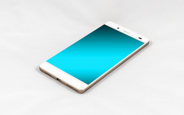 Nowoczesny smartfon z pustym niebieskim ekranem na białym tle na białej powierzchni