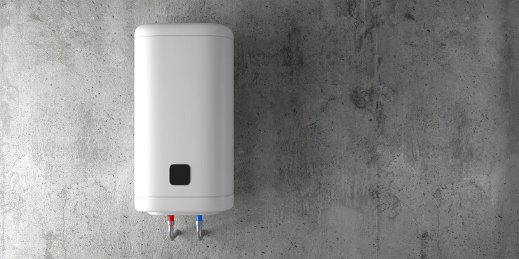 Nowoczesny smukły biały elektryczny podgrzewacz wody na betonowej ścianie