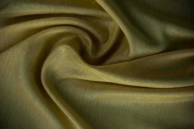 Nowoczesny złoty abstrakcyjny falisty jedwabny wzór tła Piękny kultowy papier ścienny używany jako wysokiej jakości papier ścienny i materiał dekoracyjny ślubny